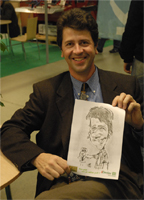 caricaturiste sur stand lors d'un salon professionnel