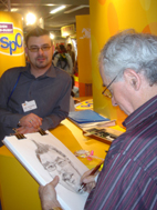 Animation caricature sur un stand d'un salon professionnel d'entreprise